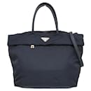 Sac à main Prada en cuir et nylon bleu marine pour femmes