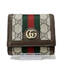 Carteira Trifold GG Supreme da Gucci