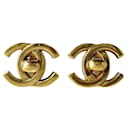 Pendientes de clip Turnlock Coco Mark de Chanel