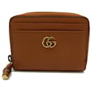 Porta-moedas de couro marrom Gucci