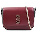 Cartier Schultertasche aus kirschrotem Leder