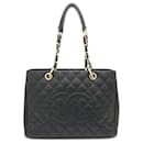 Chanel Grand Shopping Tote em couro caviar preto