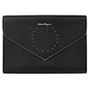 Borsa Clutch Gancini di Salvatore Ferragamo