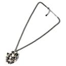 Collier en argent Chanel avec pendentif