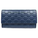 Portefeuille long bifold en cuir Guccisima bleu marine de Gucci