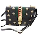 Gucci 2Way Tasche in Schwarz und Gold