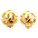 Pendientes de metal dorado Chanel