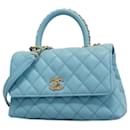 Sac à main en cuir caviar bleu clair Chanel