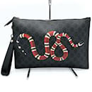 Gucci Schwarze GG Supreme Clutch-Tasche