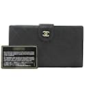 Portefeuille bi-fold en cuir bicolore Chanel