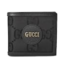 Portefeuille bi-fold Gucci en cuir GG noir