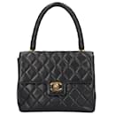 Sac à main Chanel Matelassé en agneau noir