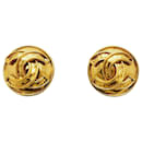 Boucles d'oreilles rondes Coco vintage de Chanel