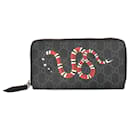 Cartera Long Bill Gucci en lona GG negra