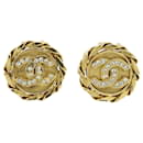 Pendientes vintage chapados en oro Chanel Coco Mark