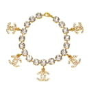 Bracelet en charme doré avec strass Cocomark de Chanel