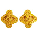 Boucles d'oreilles clip en or vintage Chanel avec fleur Coco