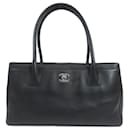 Bolsa executiva Chanel em couro de bezerro preto