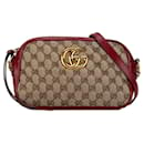 Bolso de hombro pequeño de lona GG Marmont de Gucci