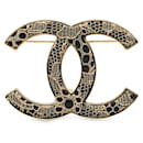 Broche en dentelle Corsage Coco Mark de Chanel