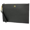 Pochette en cuir Gucci GG Marmont