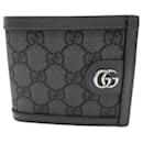 Portefeuille bi-fold Gucci en toile GG Supreme