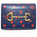 Portefeuille bi-fold en cuir bleu marine Gucci