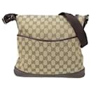 Bolso de hombro Gucci de lona GG beige y marrón