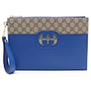 Gucci Interlocking G GG Supreme Clutch Bag