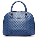 Bolsa de mão em dôme microguccissima média azul Gucci