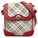 Bolso cruzado de lona Nova Check Burberry en color beige