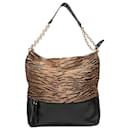 Schwarze und beige Christian Louboutin Leder- und Raffia-Hobo-Tasche