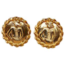 Boucles d'oreilles clip Mademoiselle en or Chanel