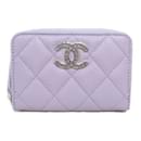 Porte-monnaie en cuir caviar violet Chanel