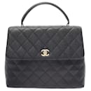 Sac à main Chanel Matelassé en cuir caviar noir