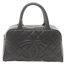 Sac à main Chanel Matelassé en cuir caviar noir