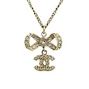 Collier accessoire en ruban avec marque Coco CHANEL et strass - Chanel