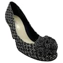 Chanel Black / White Tweed Camellia Pumps