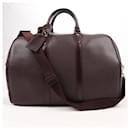 Borsa da viaggio Louis Vuitton Taiga Kendall GM in bordeaux