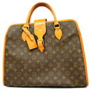 Louis Vuitton Monogram Rivoli Handbag