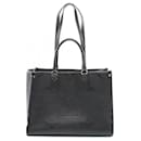 Bolsa tote Louis Vuitton On the Go MM Monogram Empreinte Noir