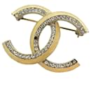 Broche Chanel Marca Coco Strass