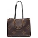 Bolsa tote Monogram gigante reverso On the Go MM da Louis Vuitton