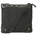 Gucci GG Canvas Studded Shoulder Bag