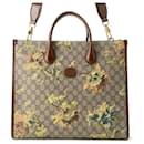 Bolso tote Gucci GG Supreme con estampado de flores G entrelazadas