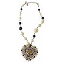 Collana vintage CHANEL in perle finte nere e bianche a forma di cuore con strass. - Chanel