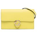 Portefeuille Gucci interlocking G dollar jaune sur chaîne