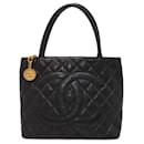 Bolsa tote de couro caviar preto Chanel