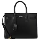 Bolso Baby Sac De Jour de Saint Laurent hecho de cuero liso negro