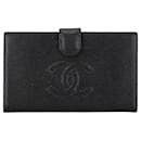 Porte-monnaie en cuir caviar noir Chanel